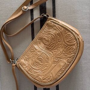 The Sak Sayulita Leather Saddle Tan Embossed boho shoulder bag